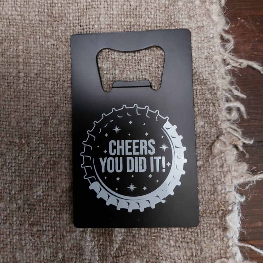 Metalen bieropener met leuke tekst: Cheers you did it!