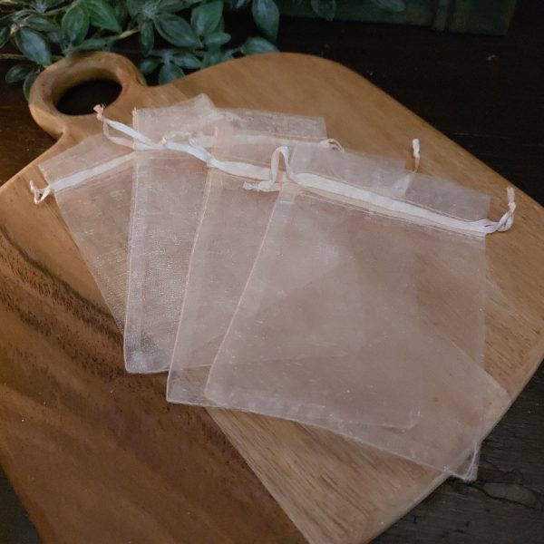 Set van 4 organza zakjes voor amberblokjes.