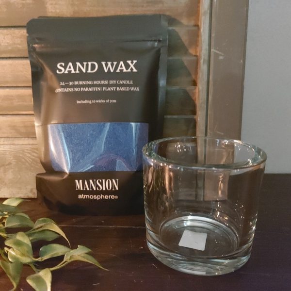 Cadeauverpakking Sand Wax in een blauwe kleur met een sfeerlicht van glas van Mansion Atmosphere.