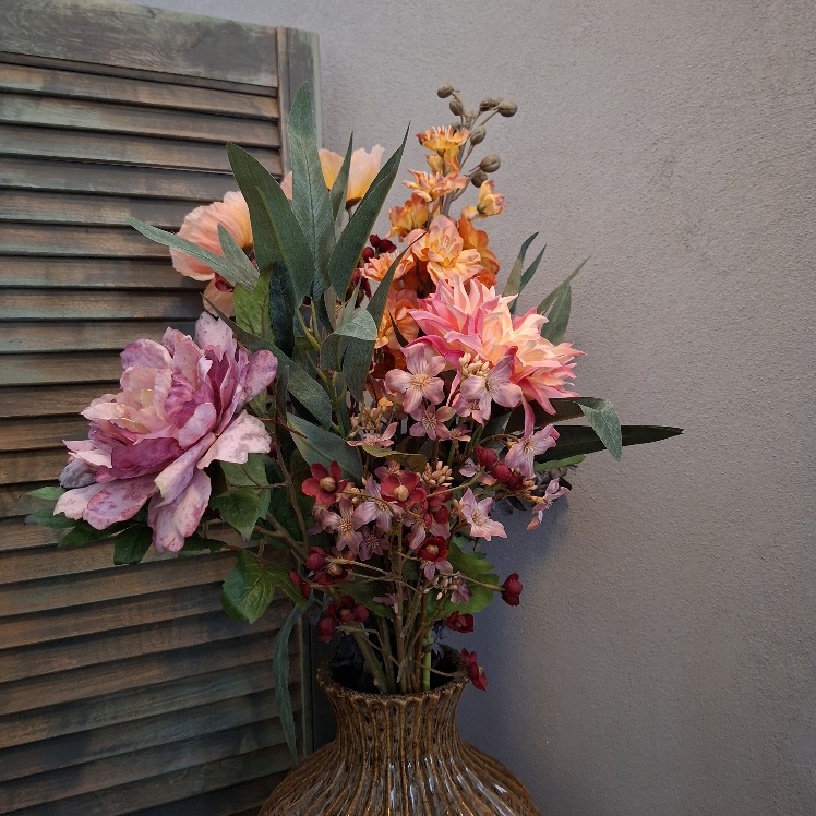 Compleet boeket zijden bloemen in warme kleuren. Exclusief verkrijgbaar bij Creatieve Decoraties voor Jou.