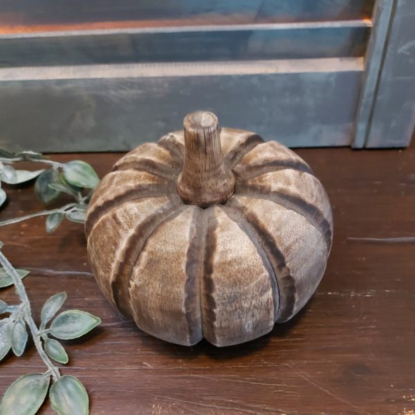 Pompoen van licht gekleurd mangohout.