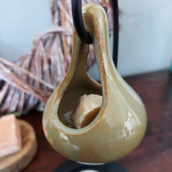 Brander voor het smelten van een amberblokje of wax.
