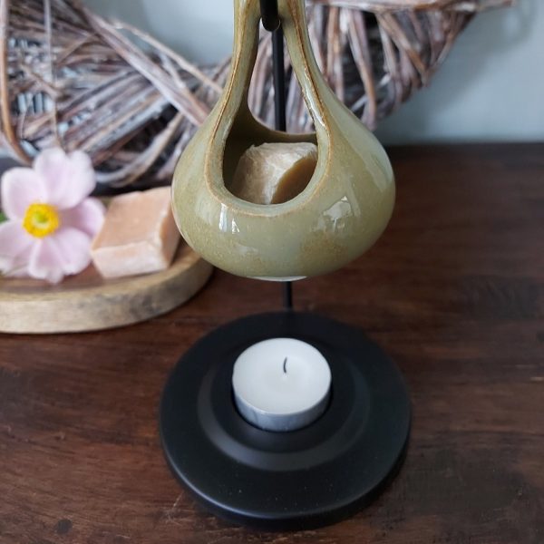 Brander voor het smelten van een amberblokje of wax.