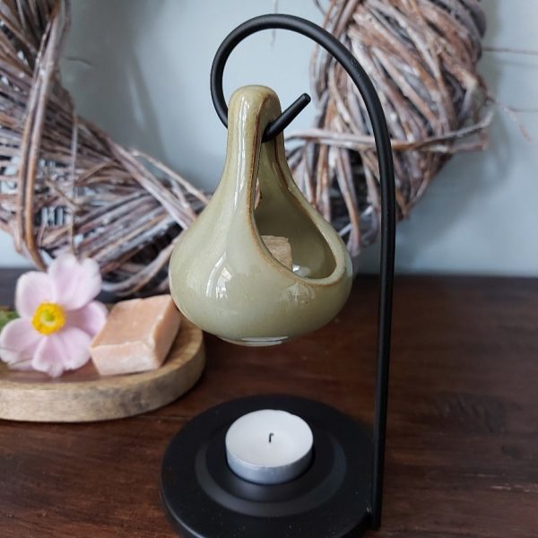 Brander voor het smelten van een amberblokje of wax.