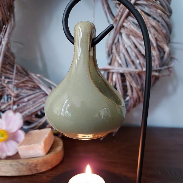 Brander voor het smelten van een amberblokje of wax.