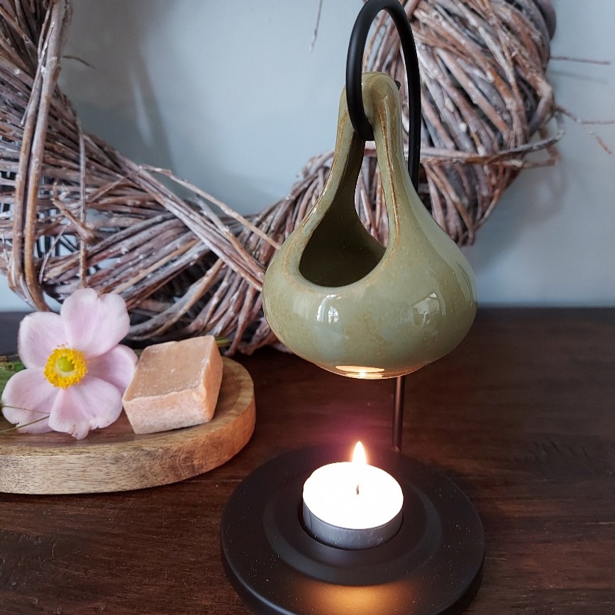 Brander voor het smelten van een amberblokje of wax.