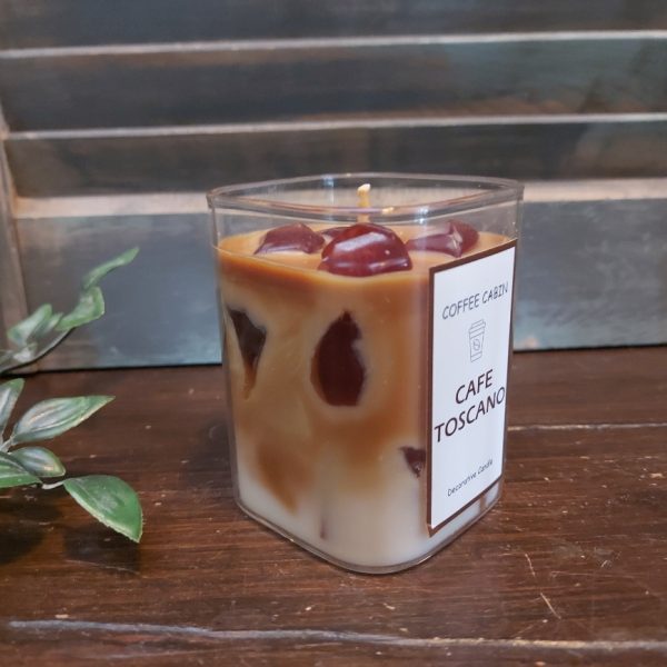 Decoratieve geurkaars in een glas met koffiegeur, van het merk Mansion Atmosphere.