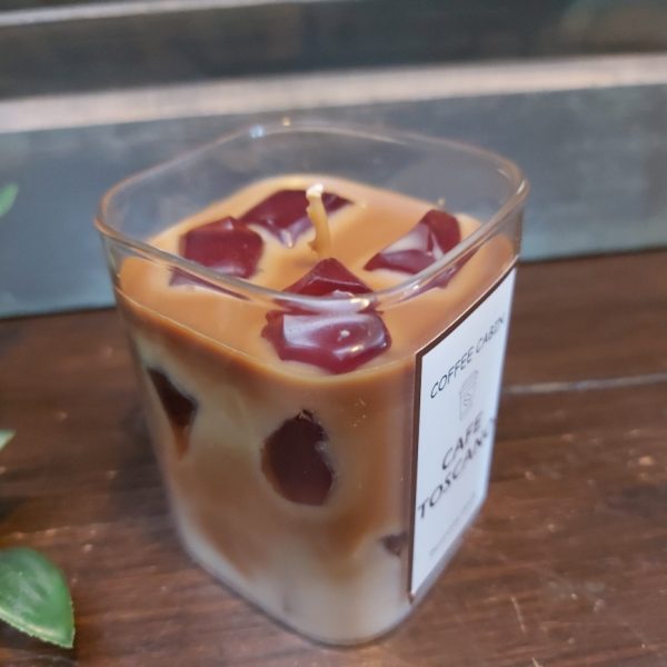 Decoratieve geurkaars in een glas met koffiegeur, van het merk Mansion Atmosphere.