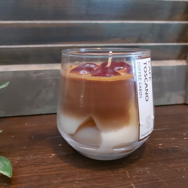 Decoratieve geurkaars in een glas met koffiegeur, van het merk Mansion Atmosphere.