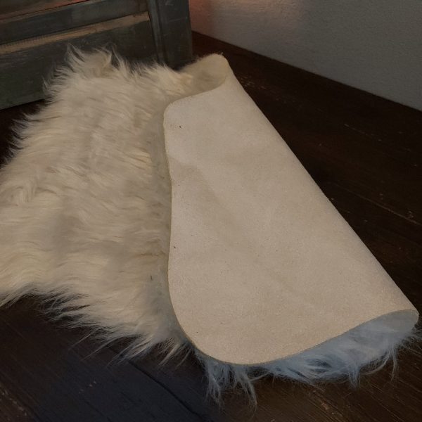 Compact vachtje in een witte kleur, van het merk Countryfield.