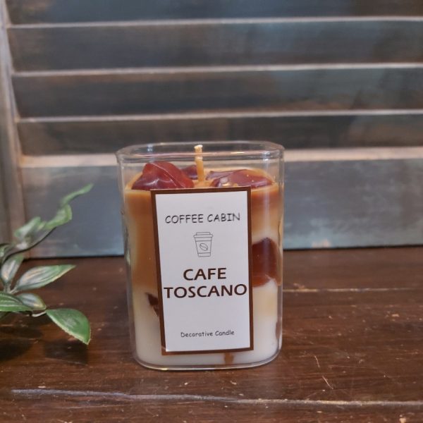 Decoratieve geurkaars in een glas met koffiegeur, van het merk Mansion Atmosphere.
