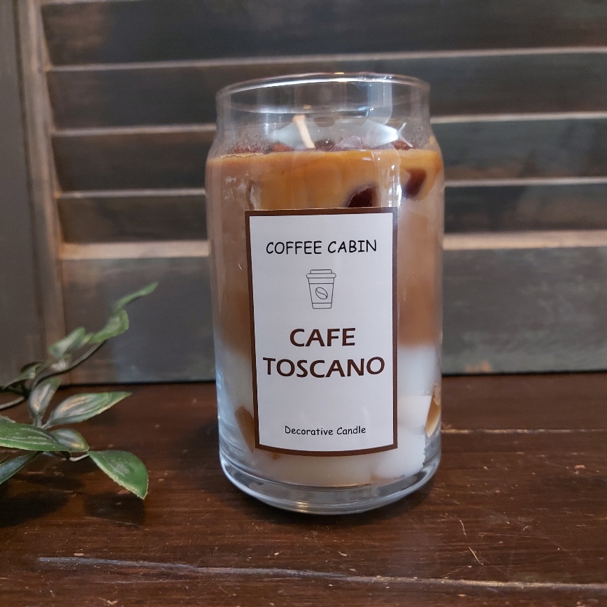 Decoratieve geurkaars in een glas met koffiegeur, van het merk Mansion Atmosphere.