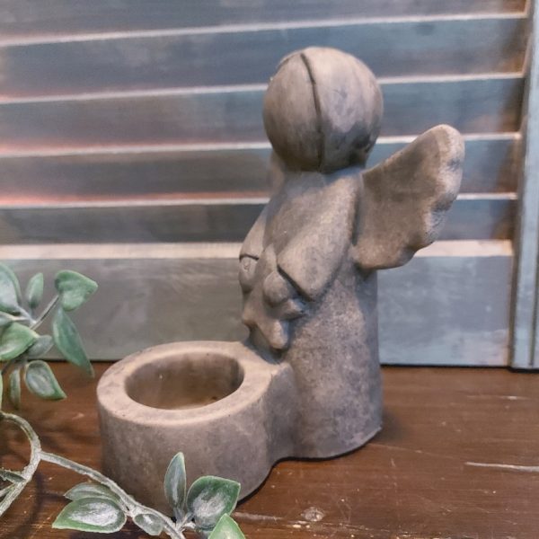 Sfeerlicht van aardewerk Engel met een ster, uit de serie Majestic Brown van het merk Brynxz.