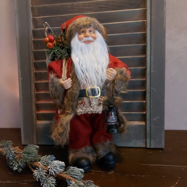 Grote kerstman met LED verlichting, gekleed in een rood vilten pak, van het merk Countryfield.