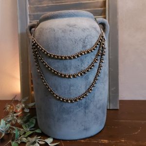 Ketting voor om een kruik van metaal, kruikketting