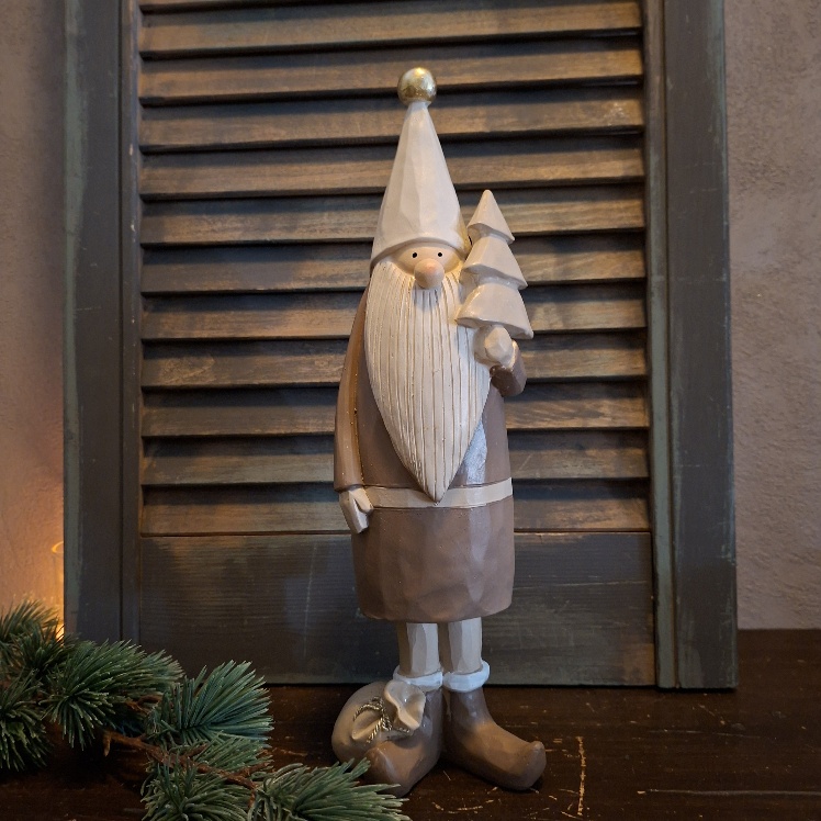 Kerstman van Polystone in zachte bruine kleurtinten, van het merk Countryfield.