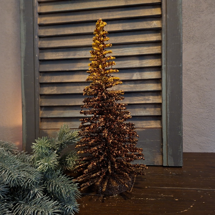 Kerstboom van hout in een bruine kleur, van het merk Mansion Atmosphere.